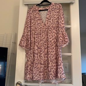 Pink and purple leopard quarter sleeve tiered ruffle dress.